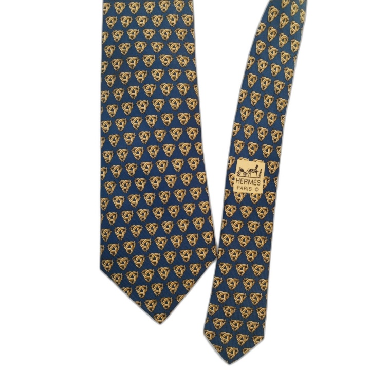 Cravate Hermès Paris Soie Bleue Motif Nœuds Dorés - Occasion Excellent