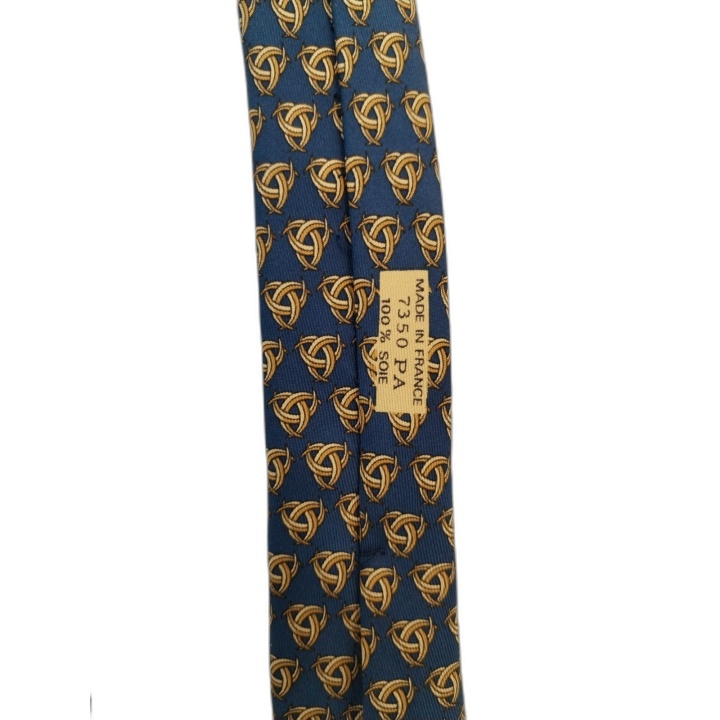 Cravate Hermès Paris Soie Bleue Motif Nœuds Dorés - Occasion Excellent